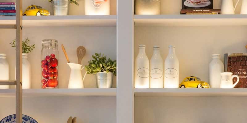 Kitchen decluttering - Put things back into the cupboards with like items